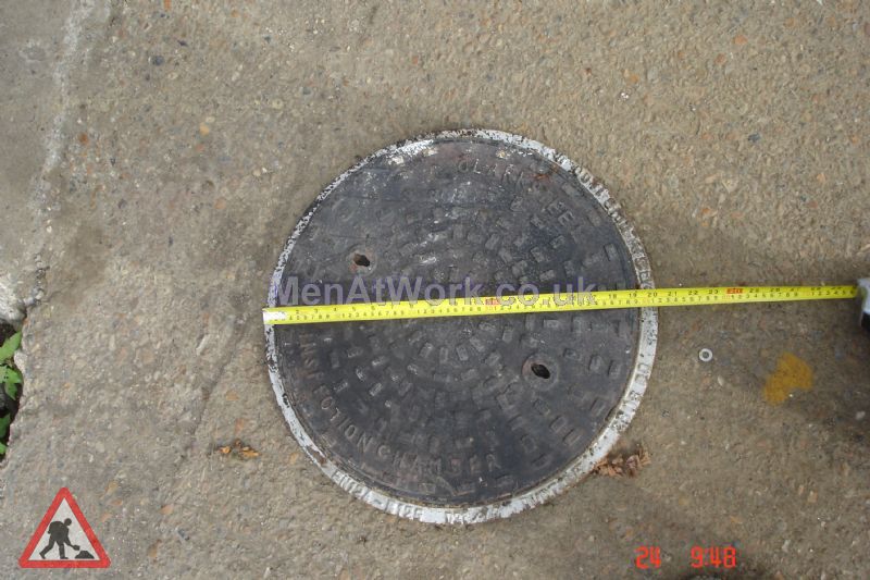 Man hole cover - Circular ‘Clarks’ – scale view