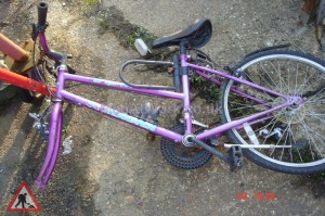 Broken Bike - Pink, Wheel missing.